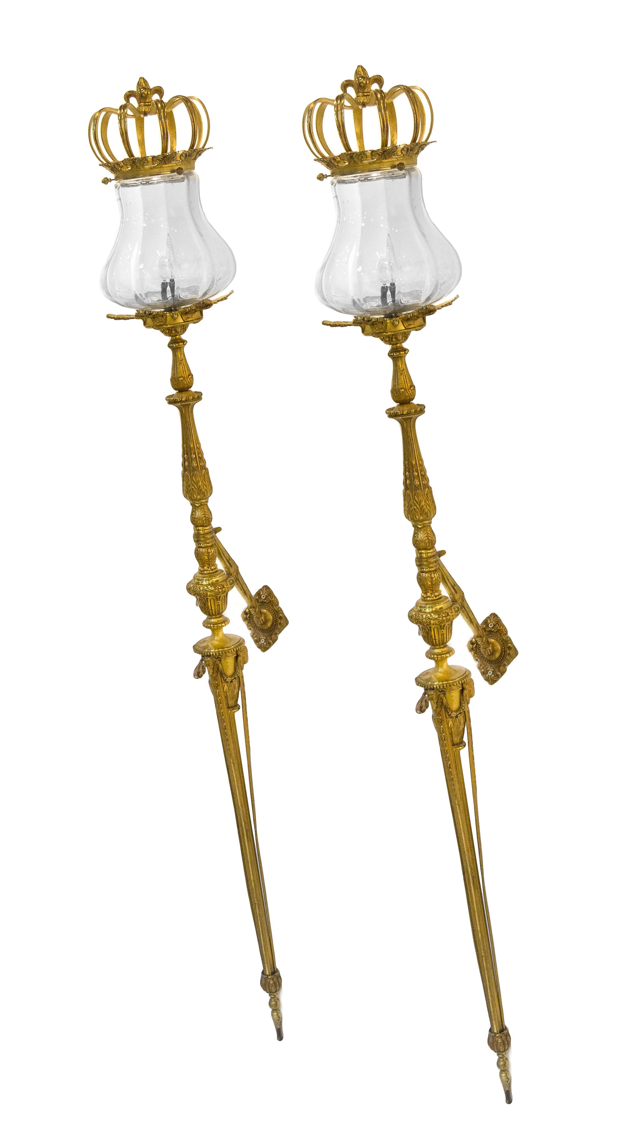 A Pair of Continental Bronze Sconces Height 72 1/2 inches. — 19TH/20TH CENTURY
