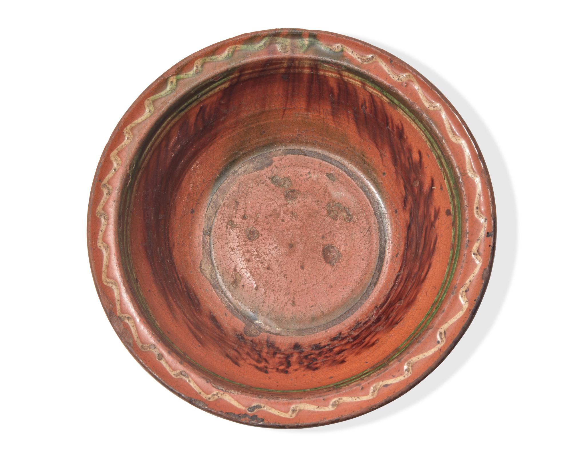 A Glazed and Slip-Decorated Redware Bowl, Maryland or Pennsylvania, Mid-19th Century