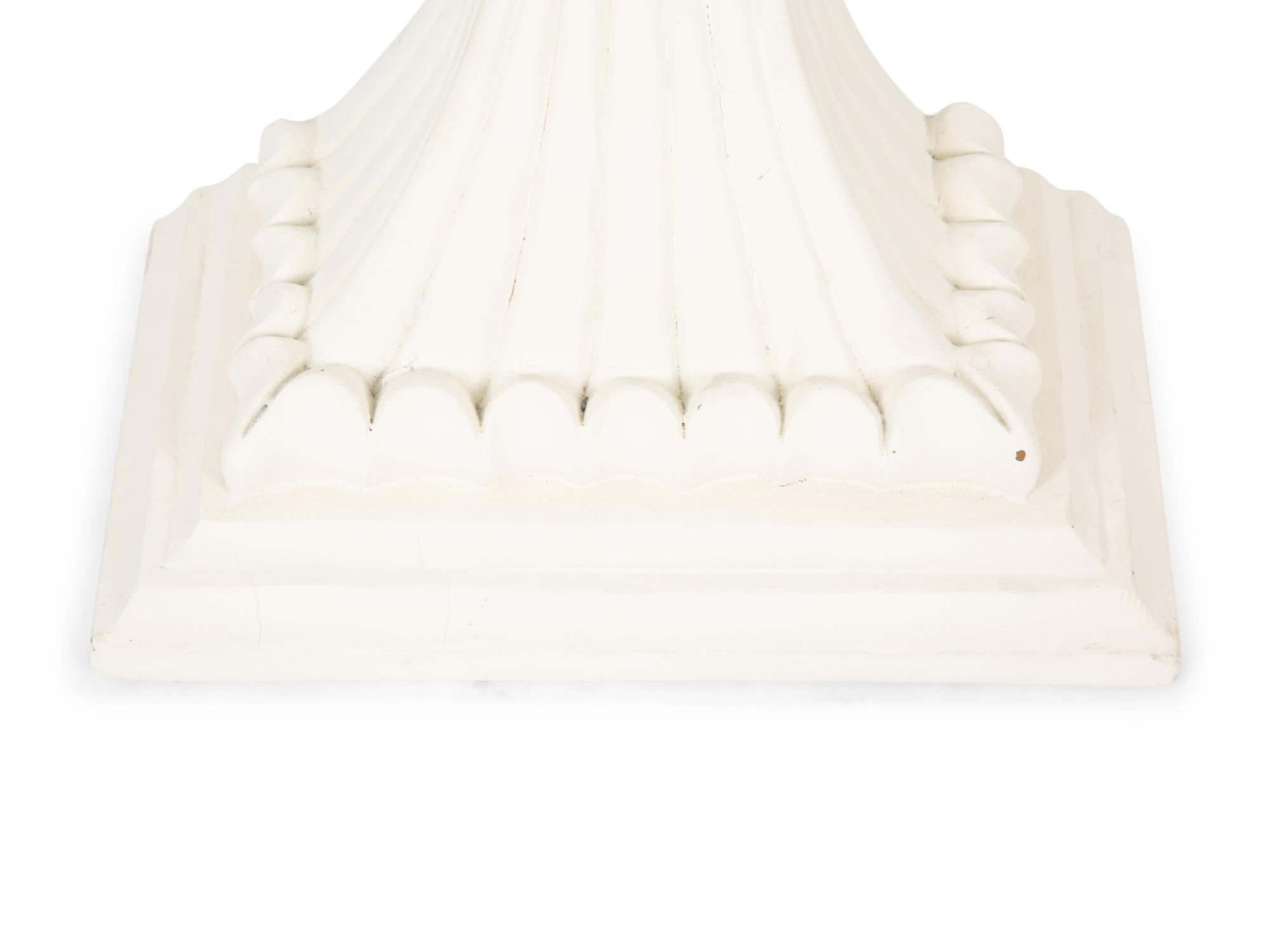 A Pair of Neoclassical Style White Composition Wall Brackets — 20TH CENTURY
