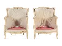A Pair of Louis XV Carved and White-Painted Low Bergères