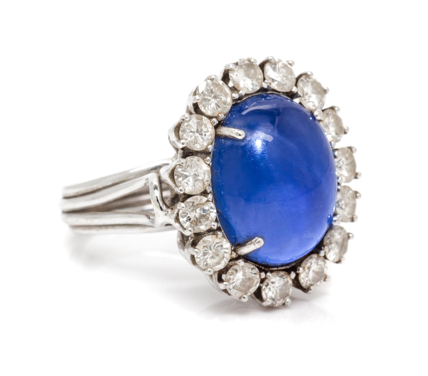 A Platinum, Star Sapphire and Diamond Ring, 11.80 dwts.