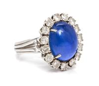A Platinum, Star Sapphire and Diamond Ring, 11.80 dwts.