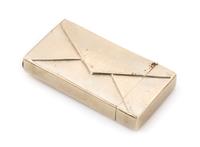 An American Silver Match Safe, Late 19th/Early 20th Century, in the form of a stamped envelope.