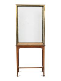 An A. Ravenel Parisian Brass and Glass Retailer's Window Vitrine on Oak Stand