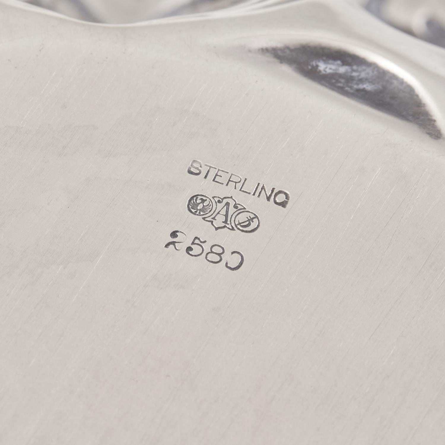 An American Art Nouveau Silver Floral Repousse Bowl