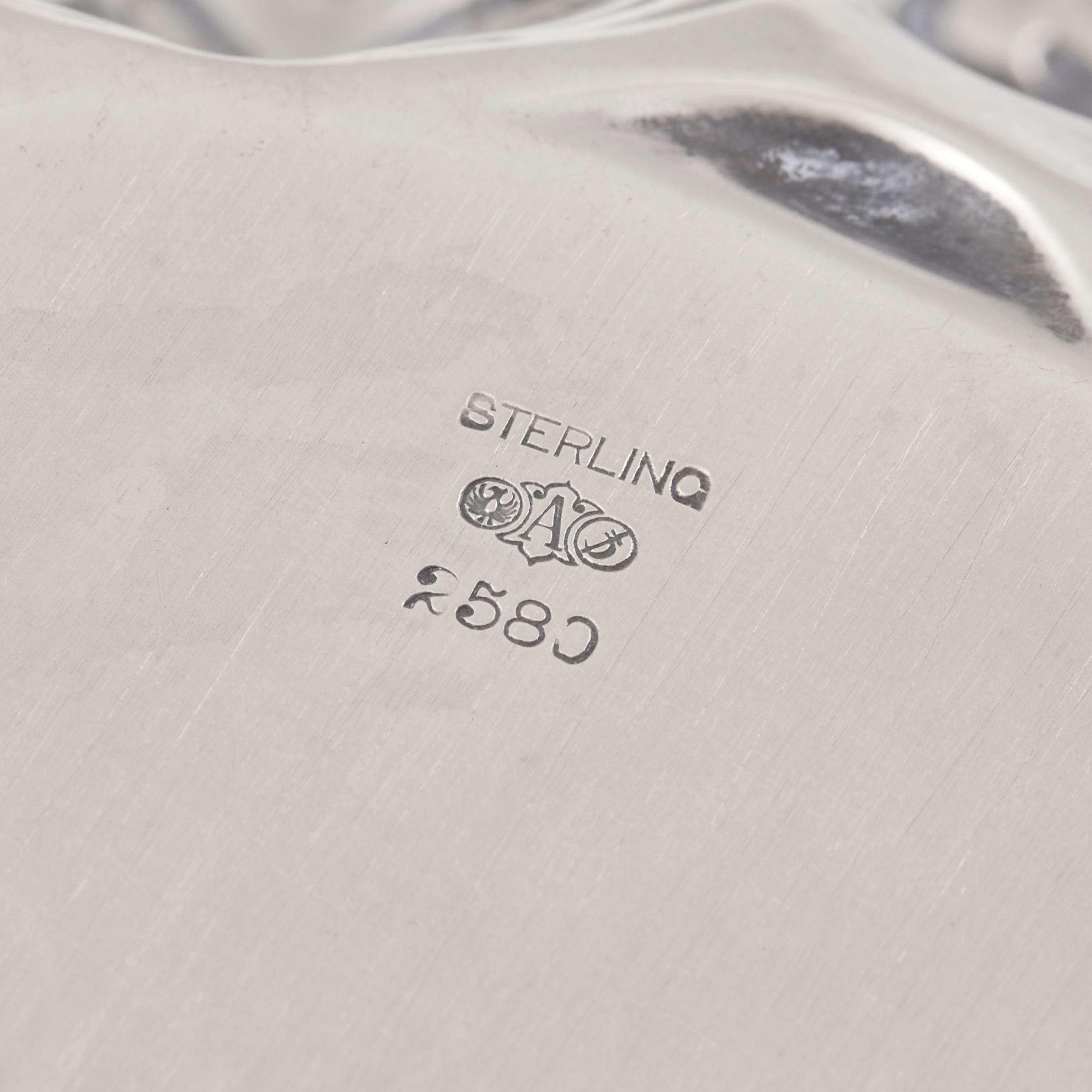 An American Art Nouveau Silver Floral Repousse Bowl