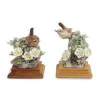 A pair of Dorothy Doughty Royal Worcester porcelain figures dated 1964