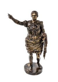 A Continental Bronze Figure, after the Antique, Height 29 inches.