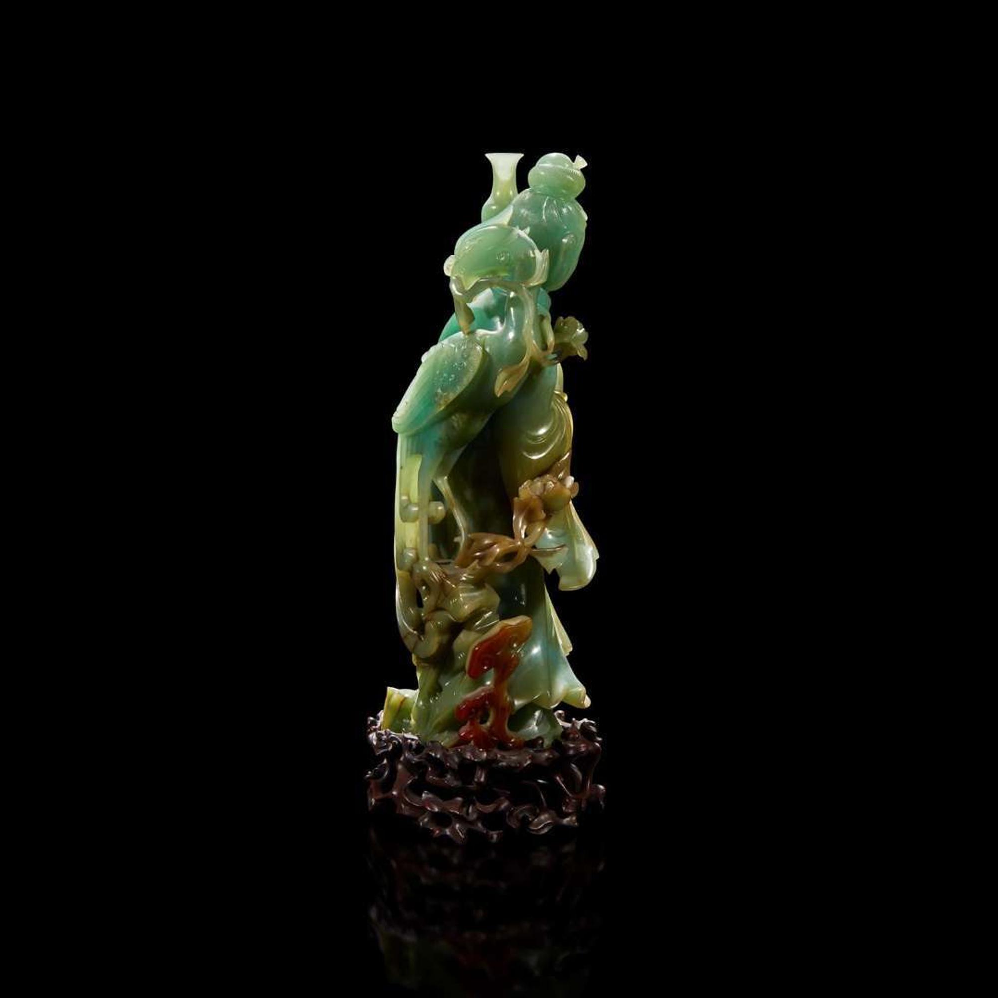A Chinese carved jadeite meiren