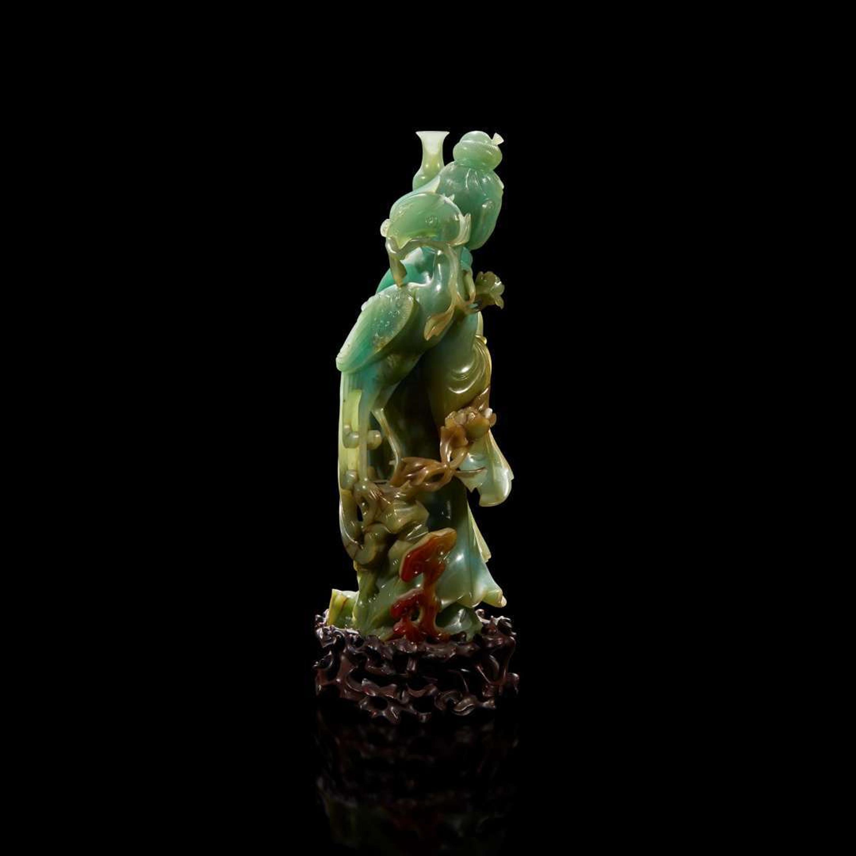 A Chinese carved jadeite meiren