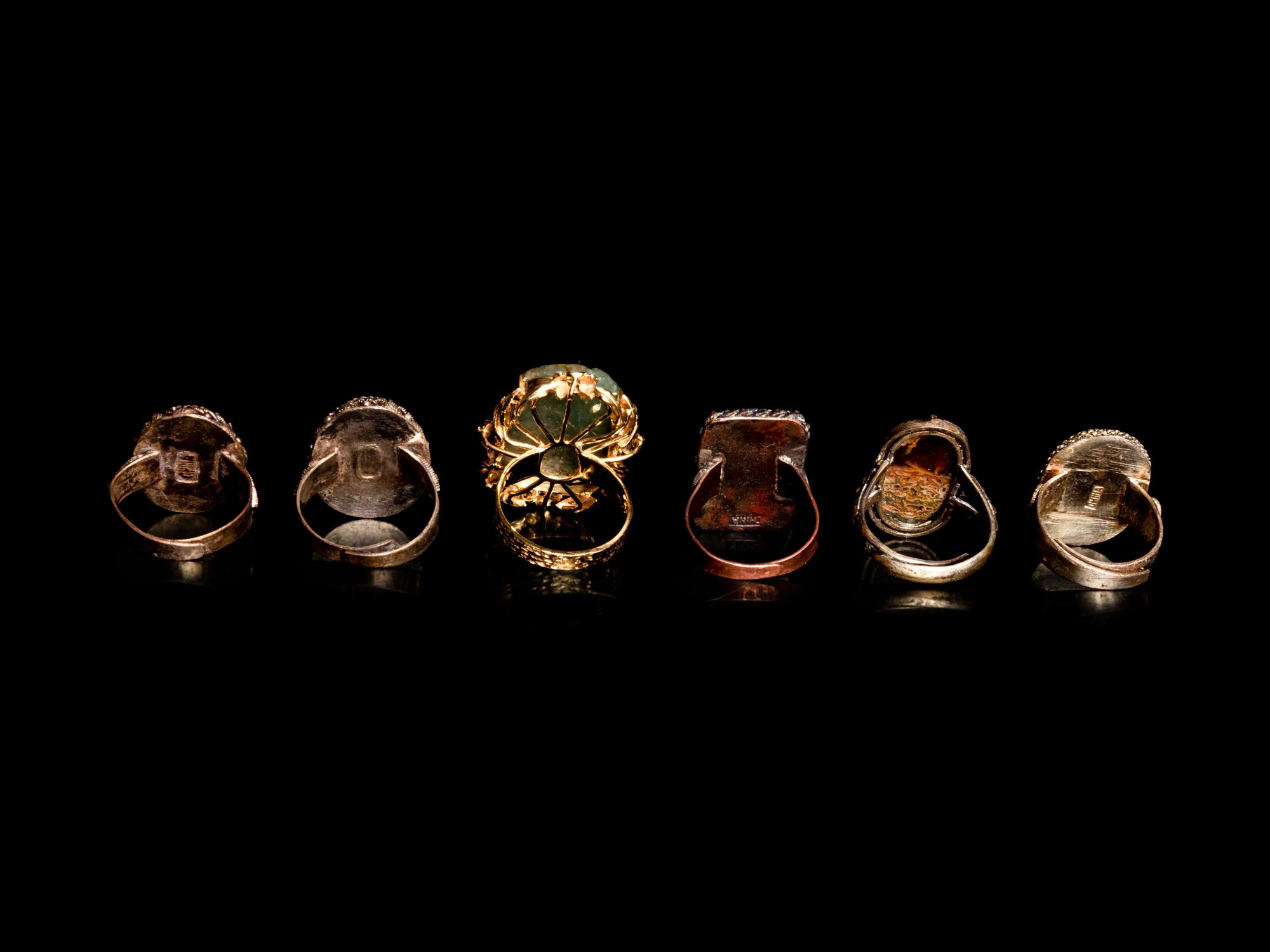 Six Chinese Hardstone Inset Metal Mounted Rings