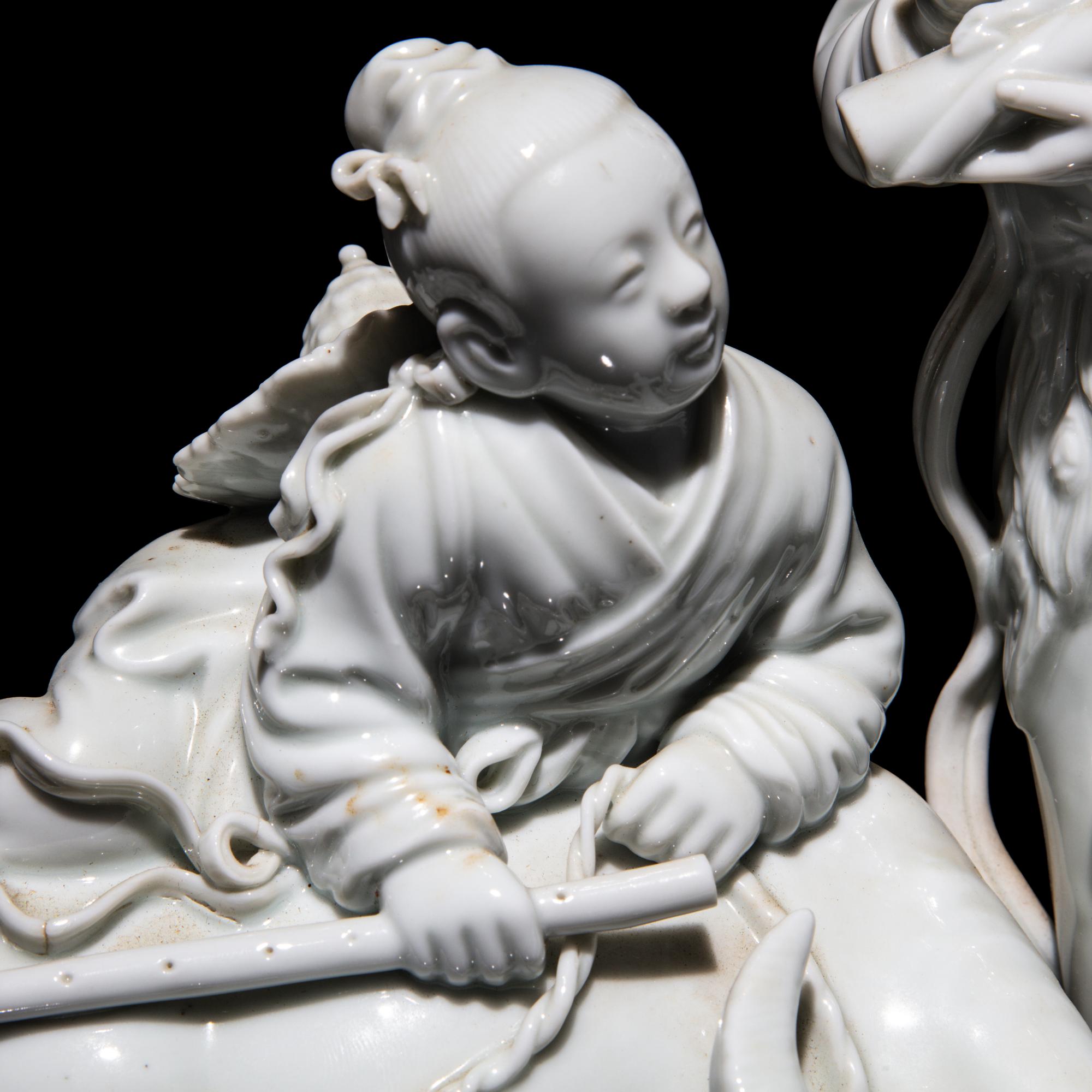 A Chinese Blanc de Chine Figural Group of the Weaver Girl and Herd Boy