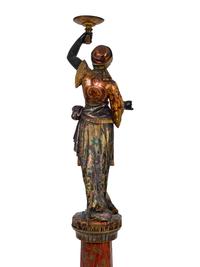 An Italian Carved and Painted Torchere of a Moor on a Pedestal Base — 19TH CENTURY