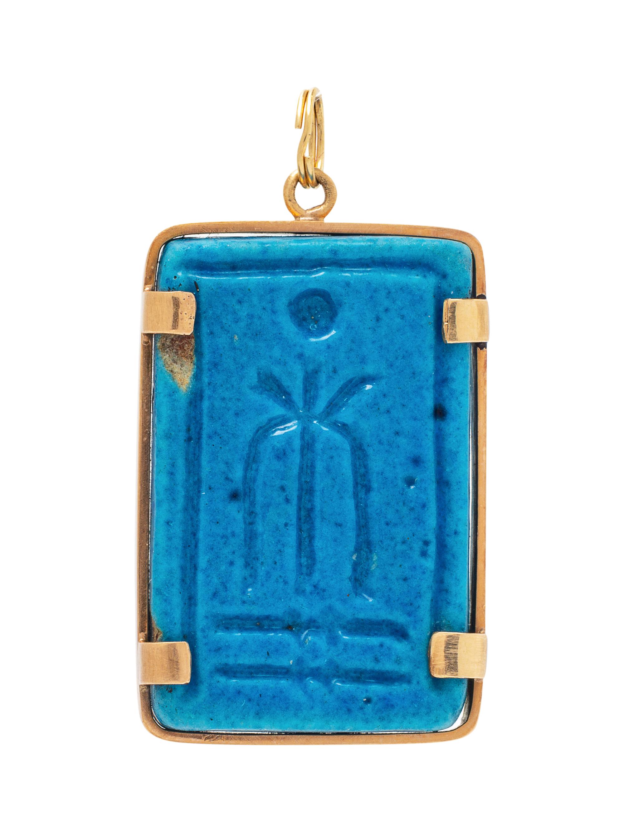 A Possibly Ancient Yellow Gold and Faience Pendant,