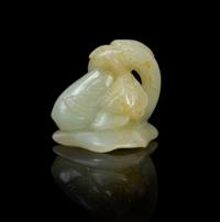 A Chinese Celadon Jade Model of a Goose 18TH/19TH CENTURY Width 1 7/8 x height 1 1/2 inches. — 18TH/19TH CENTURY