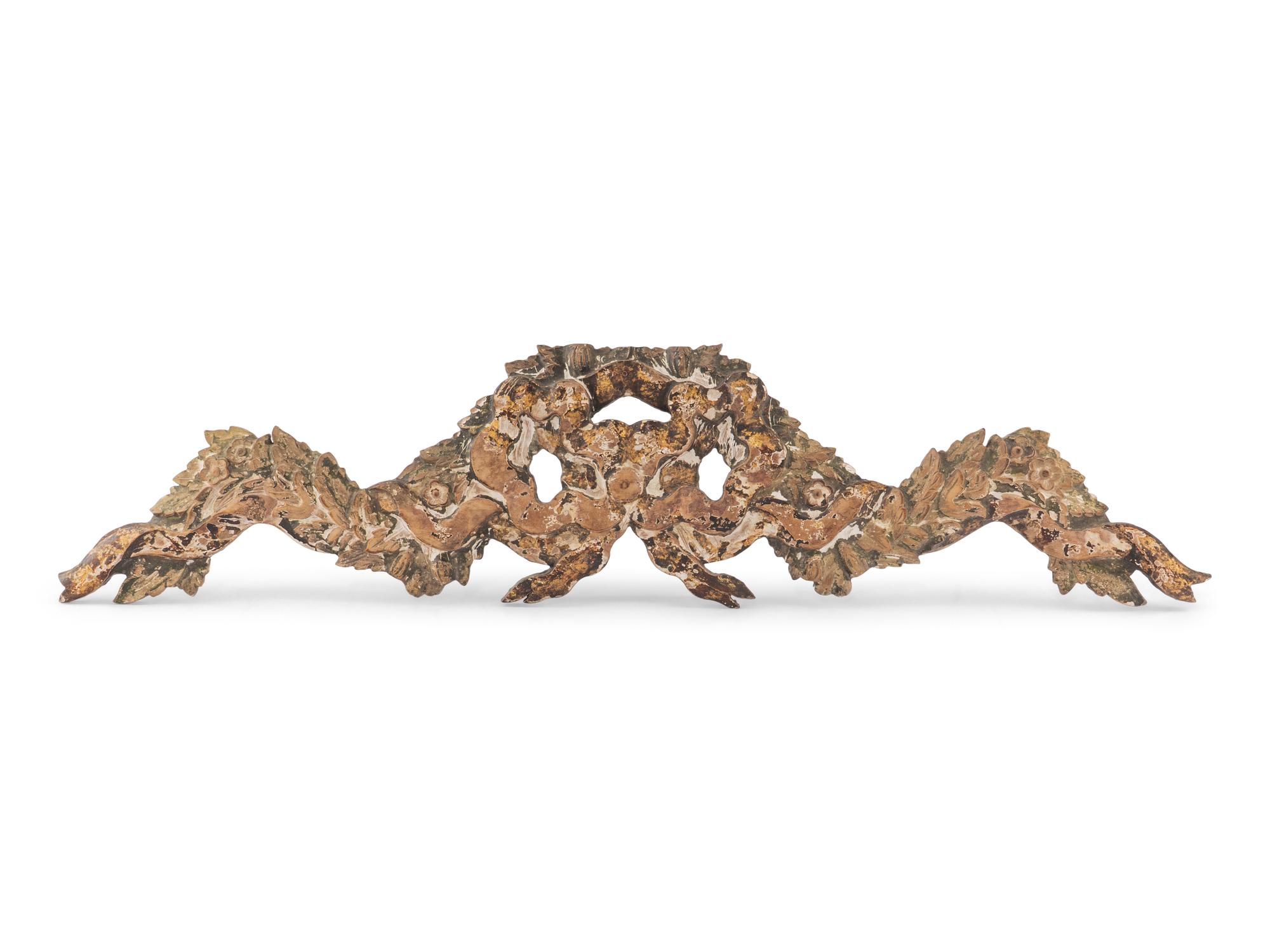 A French Carved and Polychrome Painted Wall Ornament