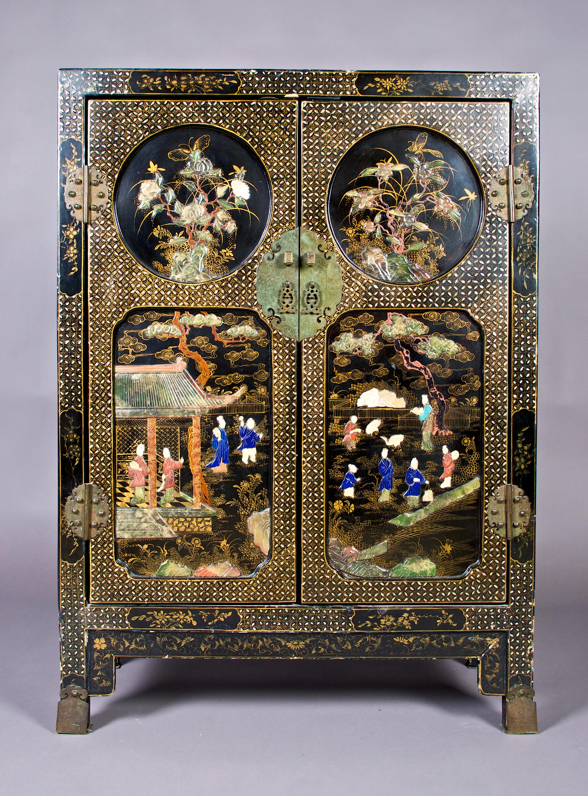 A Chinese Lacquered, Mother-of-Pearl and Hardstone Inset Cabinet, Height 43 x width 31 x depth 15 inches.