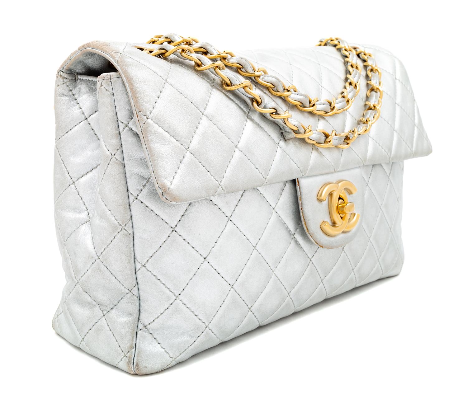 A Chanel Silver Leather Jumbo Flap Bag, 8" H x 13" W x 4" D; Strap drop: 11.5" - 20".