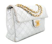A Chanel Silver Leather Jumbo Flap Bag, 8" H x 13" W x 4" D; Strap drop: 11.5" - 20".