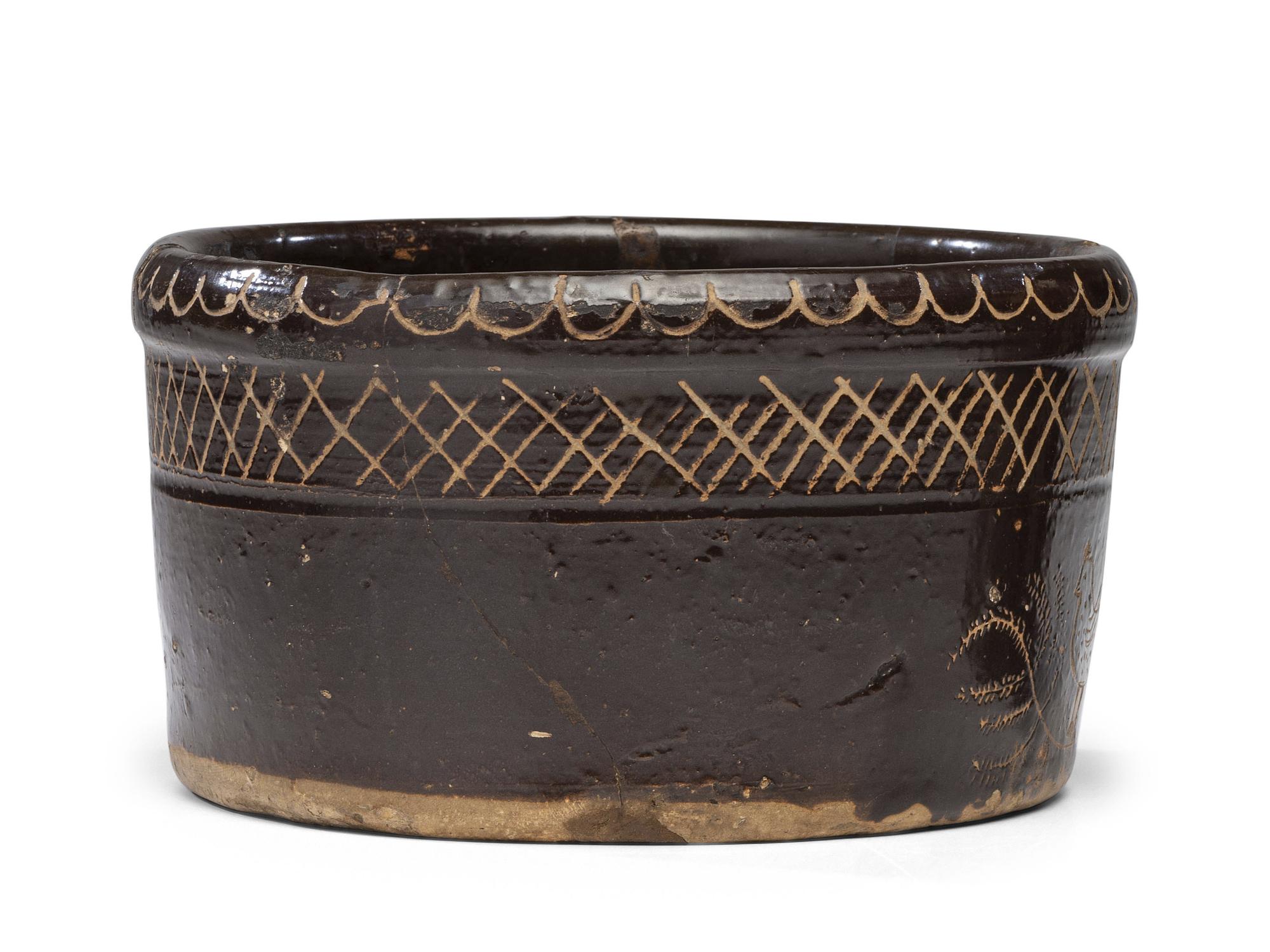 An Incised Albany Slip Presentation Butter Tub