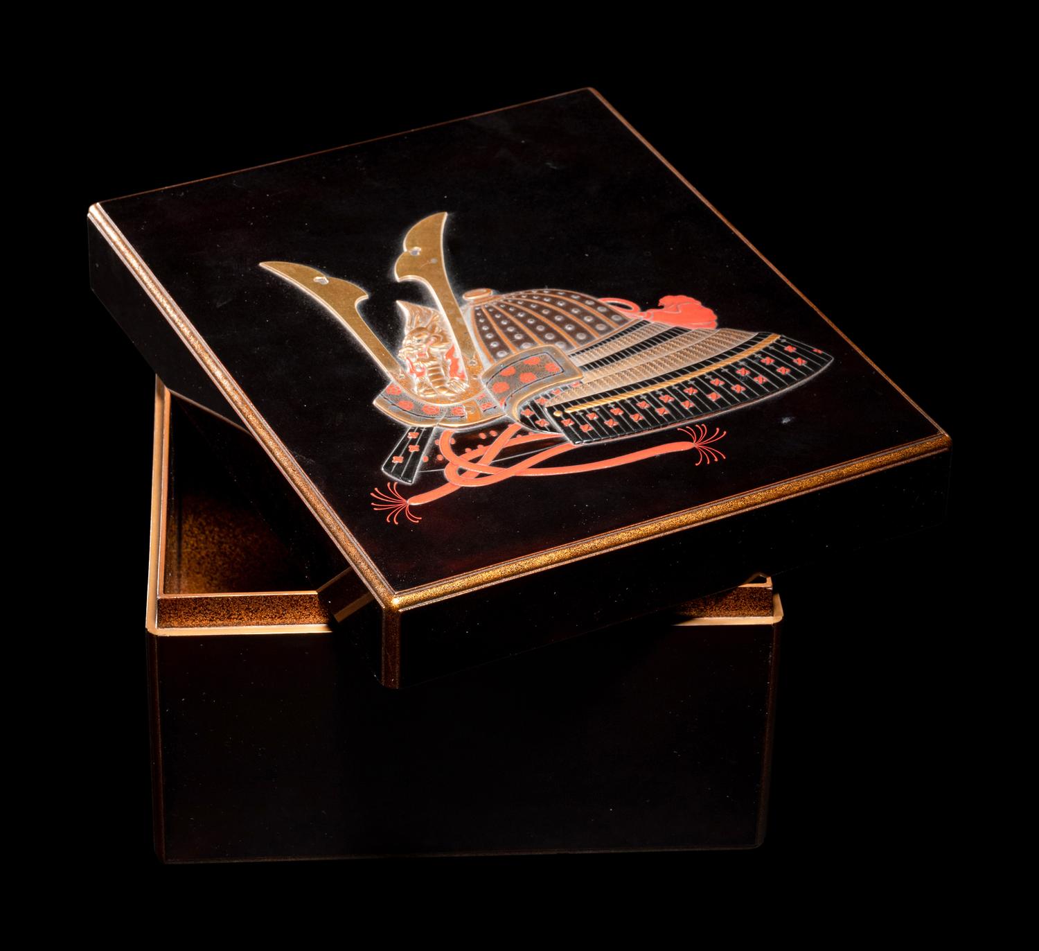 A Japanese Gold and Black Lacquer Writing Box, Suribako