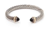 A Sterling Silver, 14 Karat Yellow Gold and Onyx 'Cable Classics' Bracelet, David Yurman, 28.50 dwts.