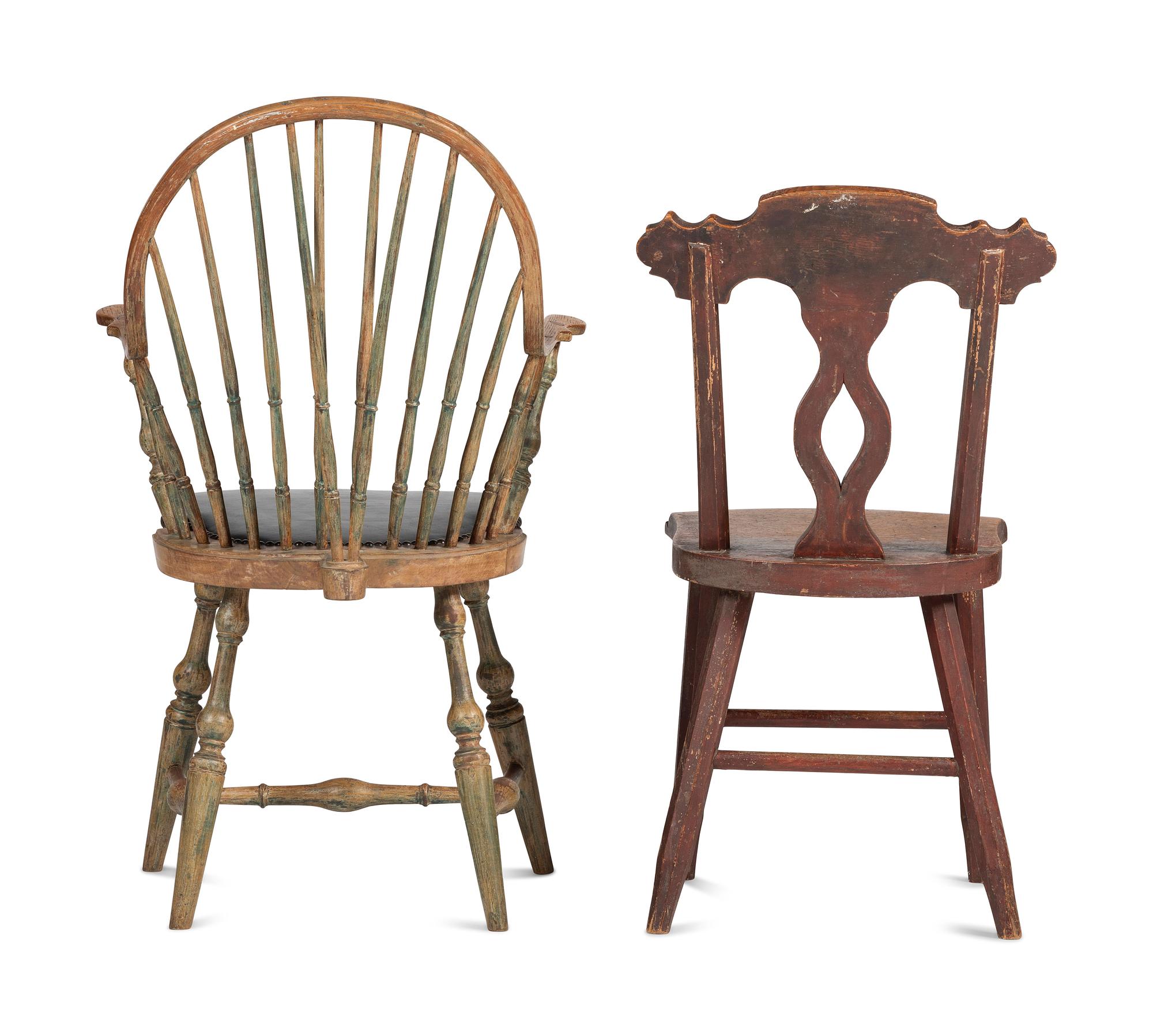 A Carved and Yellow-Painted Wood Leather Upholstered Brace Back Continuous Windsor Armchair