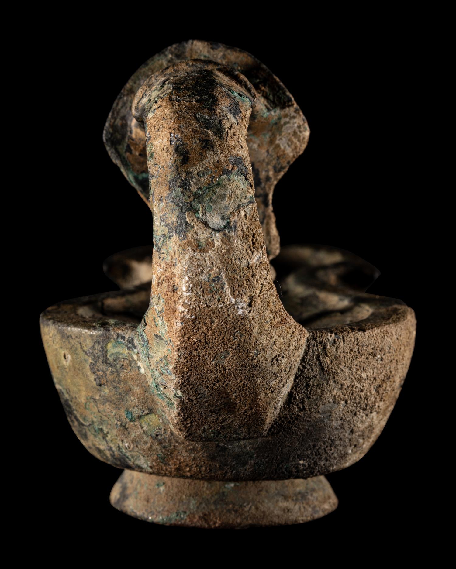 A Roman Bronze Oil Lamp