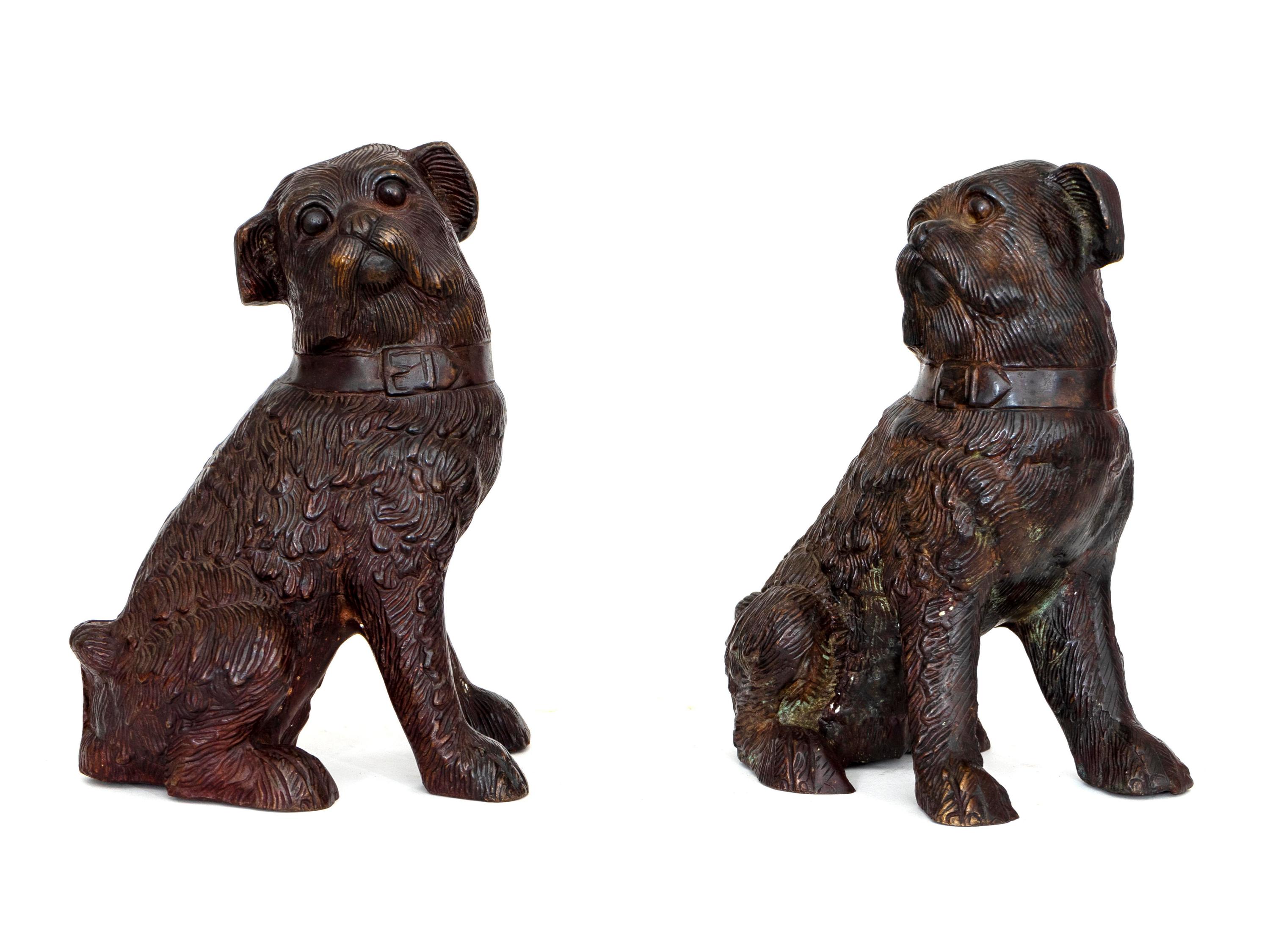 A Pair of Continental Patinated Bronze Figures of Seated Dogs — 20TH CENTURY