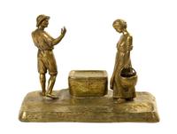 An Austrian Gilt Bronze Figural Encrier, Peter Tereszczuk (1875-1963), Height 11 x width 15 1/2 x depth 8 inches.