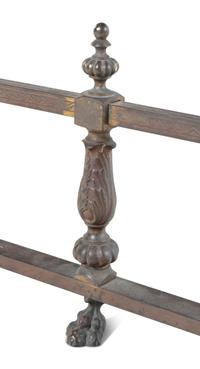 A Pair of Continental Brass and Iron Andirons and Fender