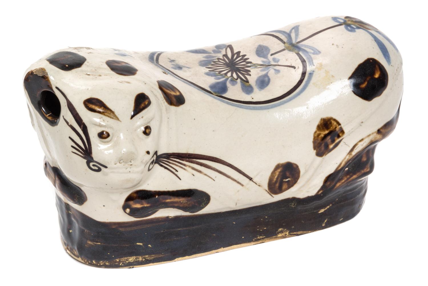A Cizhou Type Stoneware Pillow. Length 10 inches.