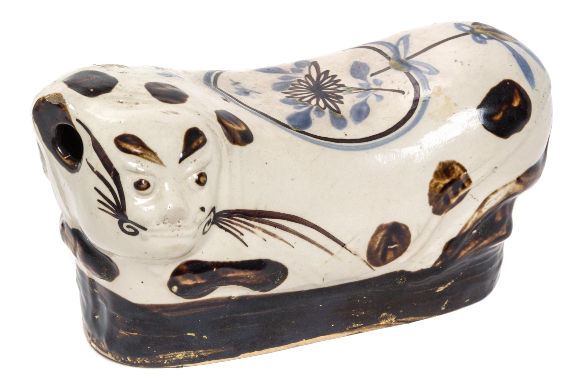 A Cizhou Type Stoneware Pillow. Length 10 inches.