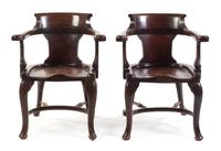 A Pair of English Mahogany Horseshoe Back Armchairs Height 33 1/2 inches.