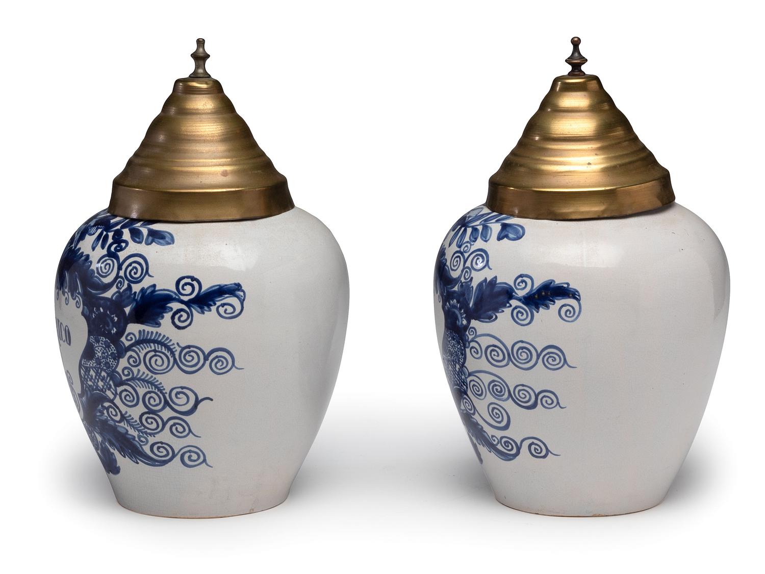A Pair of Delft Lidded Tobacco Jars