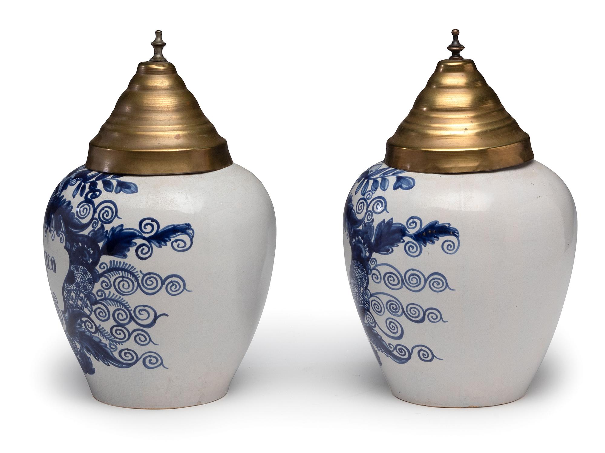 A Pair of Delft Lidded Tobacco Jars