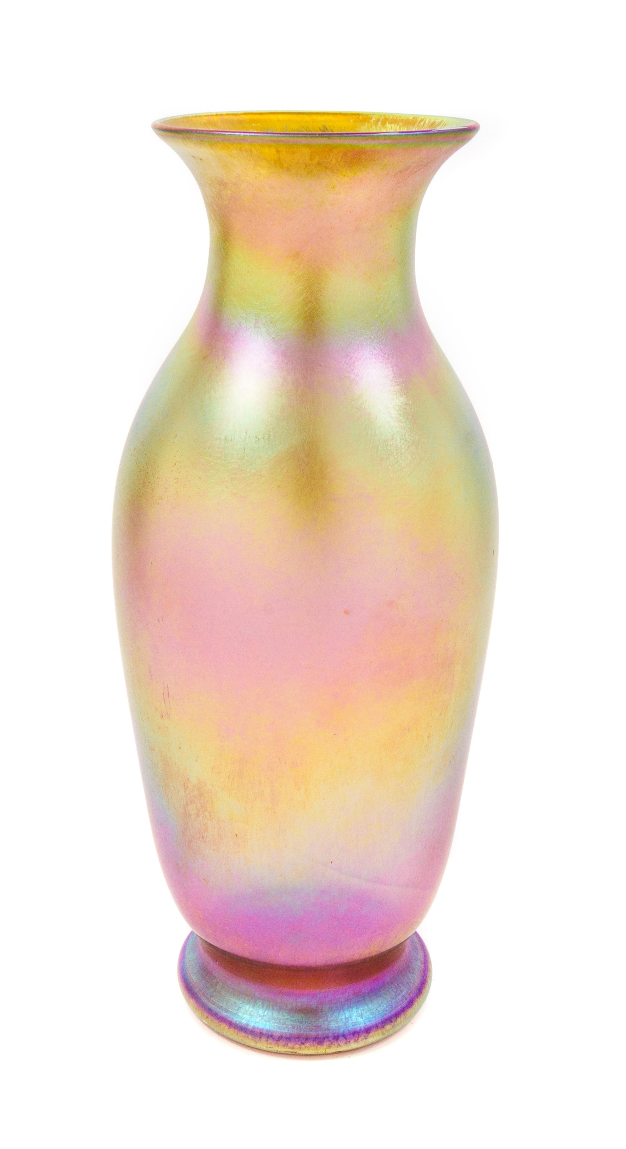 A Quezal Iridescent Glass Vase Height 15 1/4 inches.