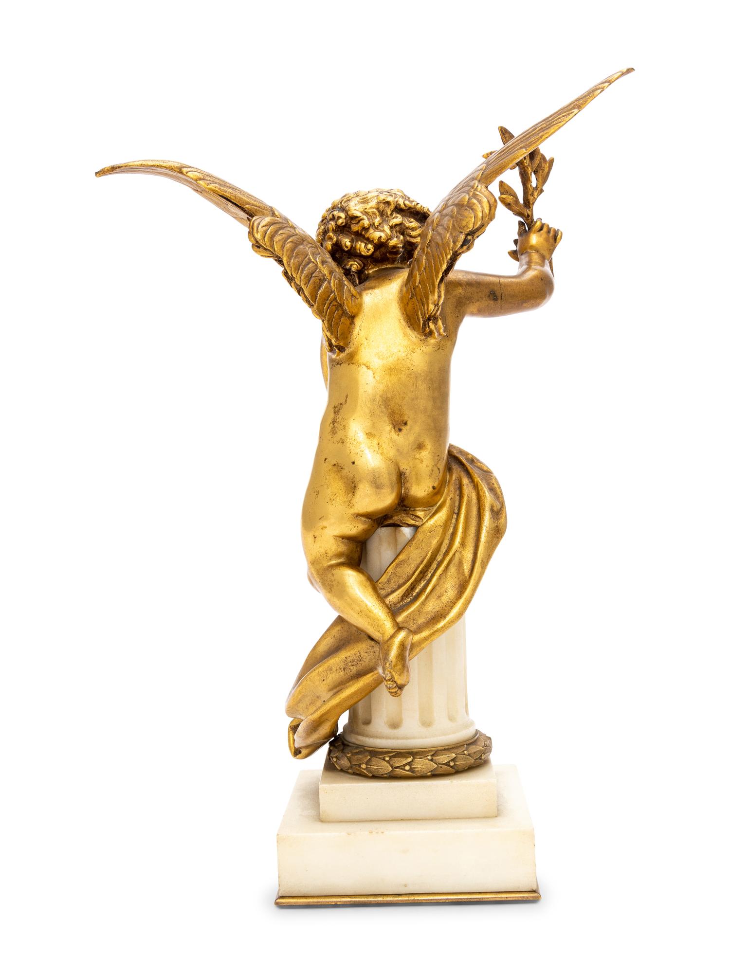 A Gilt Bronze and Marble Putto Ornament