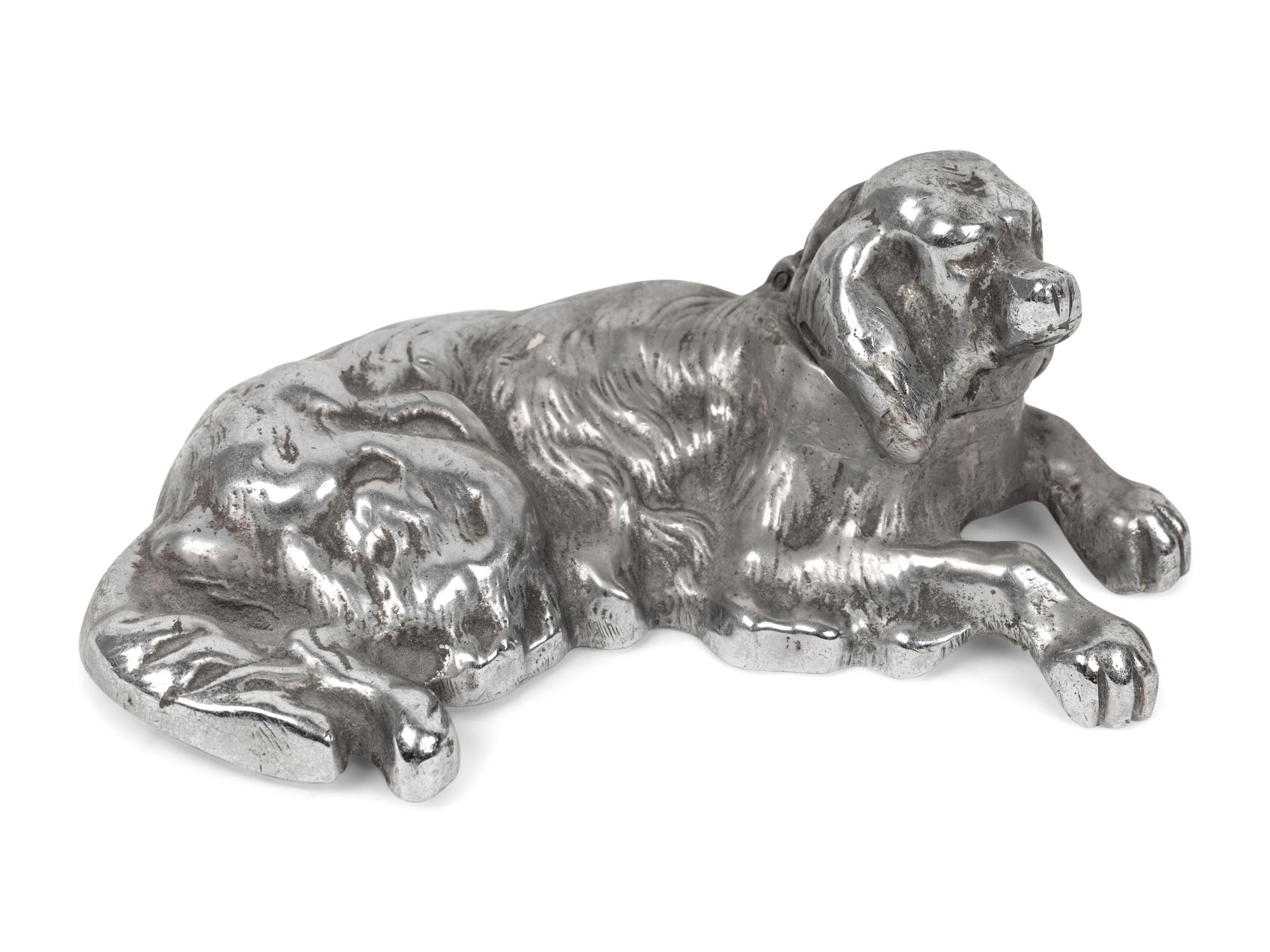 A Collection of Four Dog-Themed Inkwells