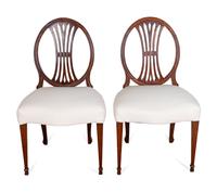 A Set of Six George III Carved Mahogany Dining Chairs and Two Similar Upholstered Back Armchairs — 18TH CENTURY