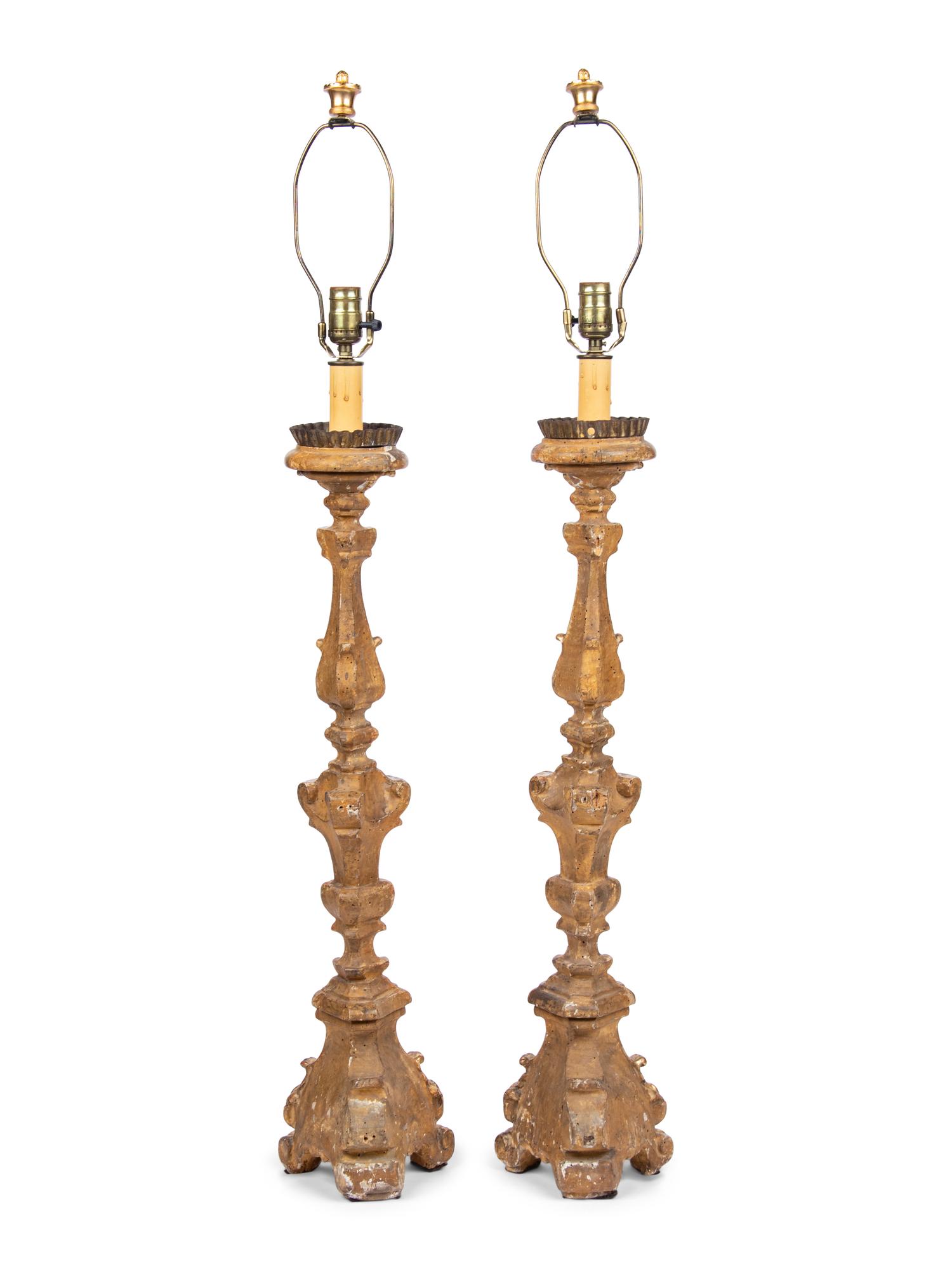 A Pair of Italian Giltwood Prickets Mounted as Lamps
