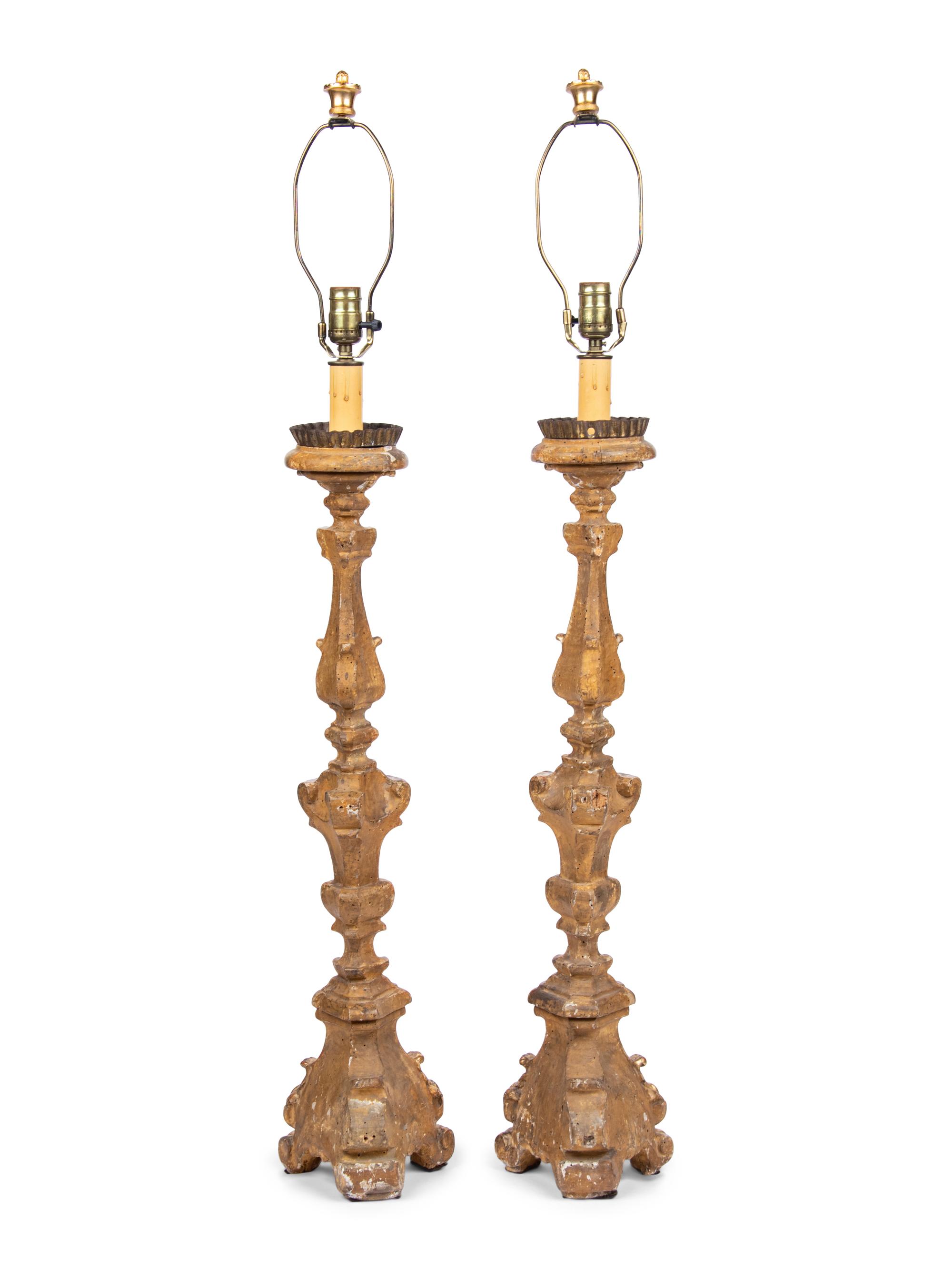 A Pair of Italian Giltwood Prickets Mounted as Lamps