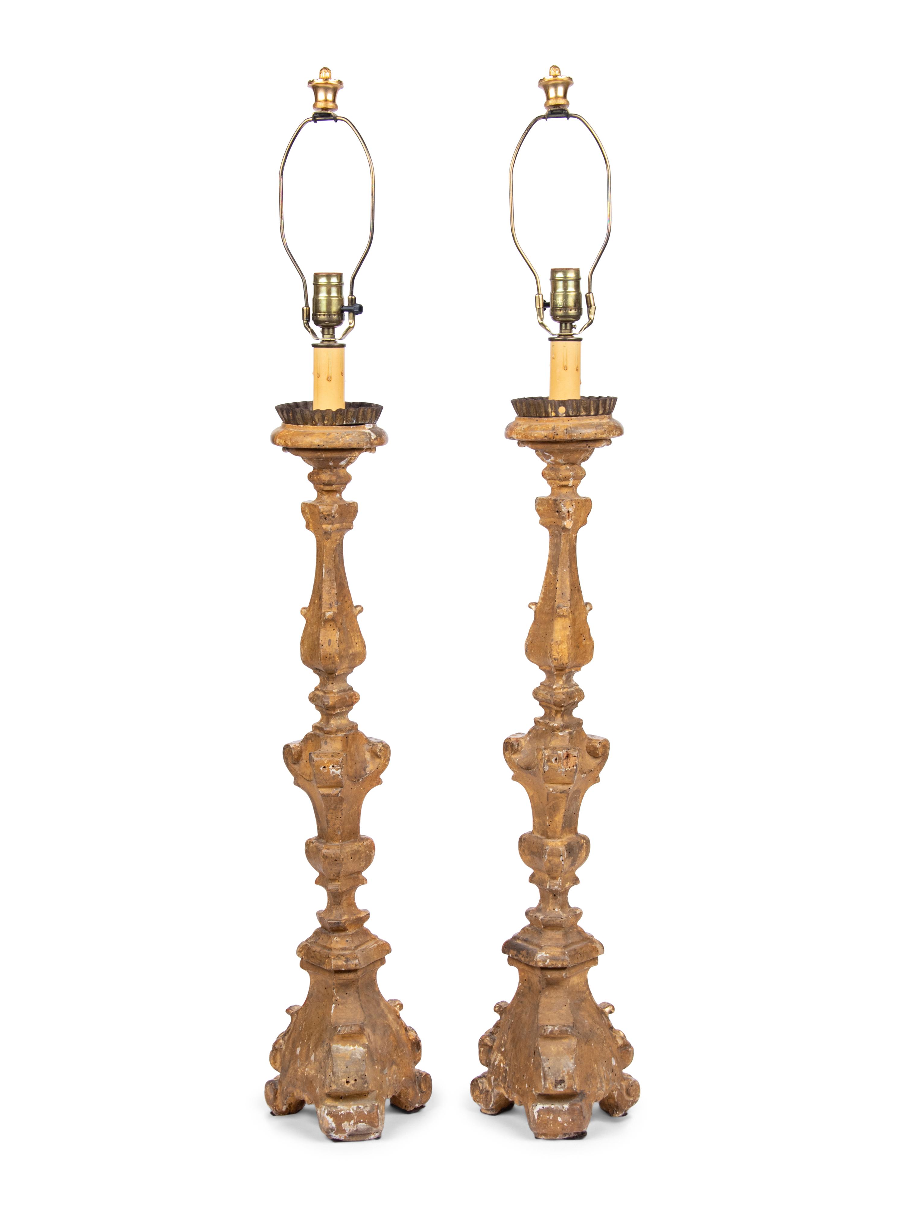 A Pair of Italian Giltwood Prickets Mounted as Lamps