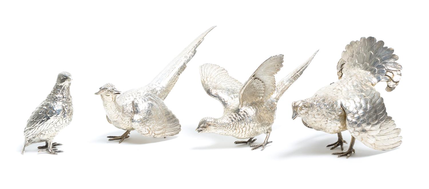 Four Silver Birds Figurines Largest height 5 3/4 x width 5 x depth 6 1/2 inches.