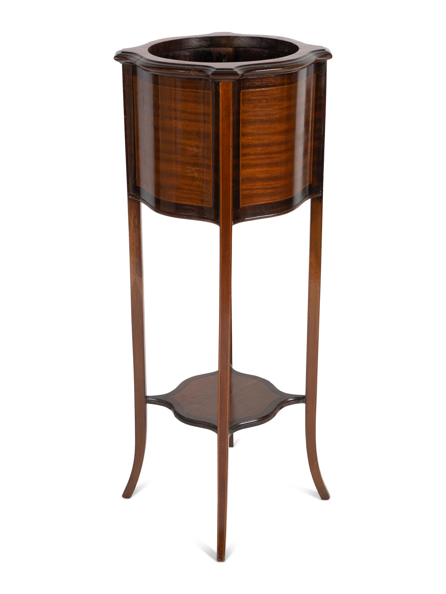 A Federal Style Mahogany Plant Stand Height 38 1/2 x width 13 x depth 13 inches.