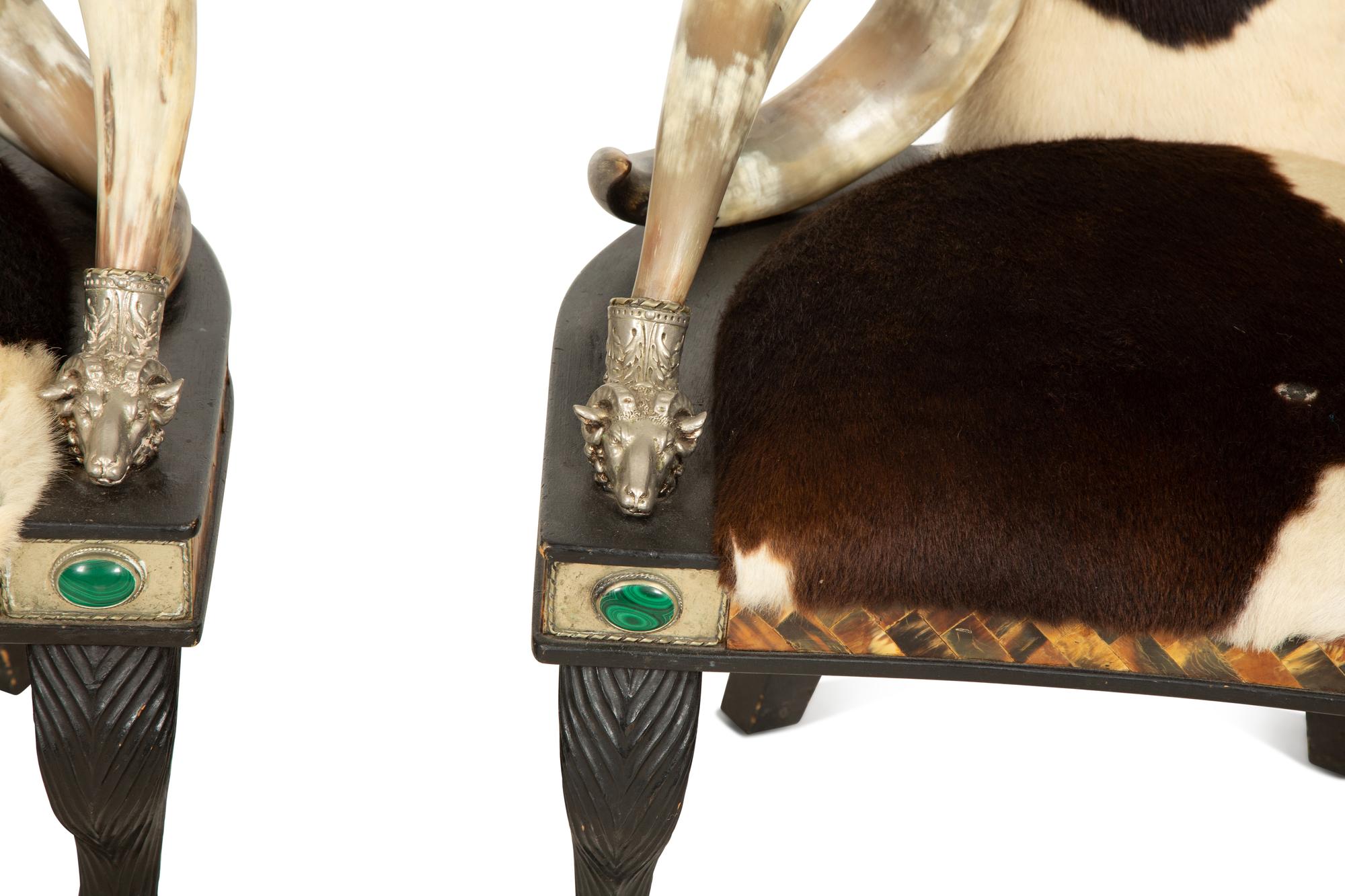 A Pair of Anthony Redmile Longhorn Chairs with Cow Hide Upholstery