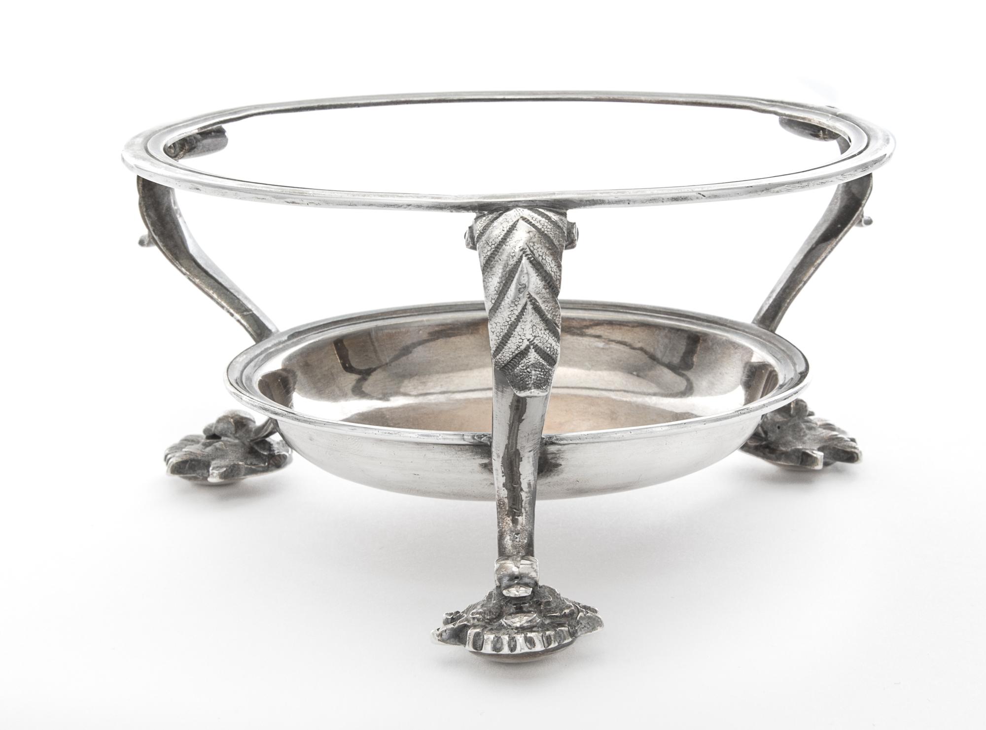 An Irish George IV Silver Stand, John Nicklin, Dublin, 1834, having acanthus decorated feet, with an underplate.