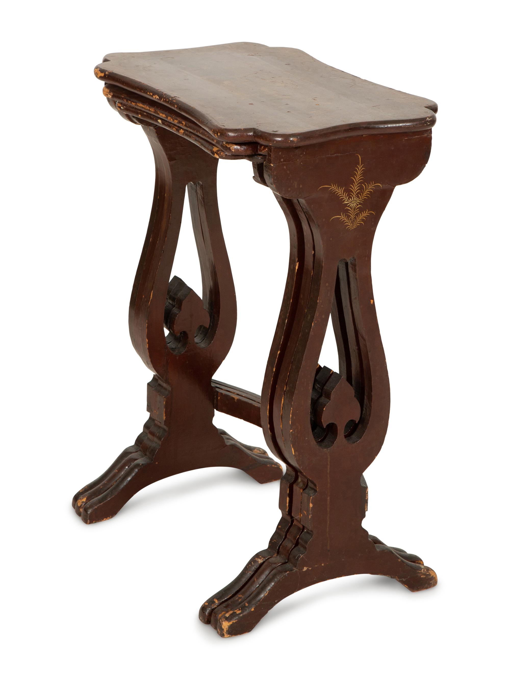 A Set of Three Chinese Export Quartetto Tables in Red and Gilt Lacquer