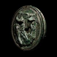 A Greek Bronze Box Mirror with Pan and Eros