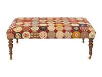 A Mahogany Needlepoint Upholstered Ottoman